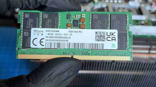 A matching 16 GB DDR5 SODIMM prepared for installation